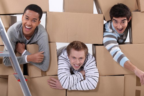 Professional office relocation planning in Nottinghill with business equipment and moving boxes