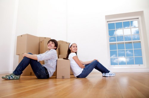 Boxes and furniture being assessed for a load-based removal estimate