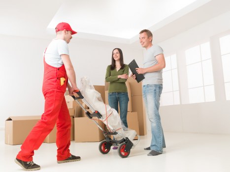 Packing furniture and equipment for a business move in Nottinghill