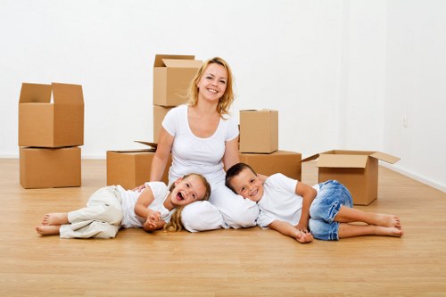 Professional movers handling apartment access during a Nottinghill removal