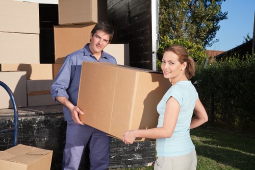 Office relocation setup with movers and equipment in Notting Hill